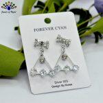 Stone Studded Bow Designed Triangular Drop Earrings