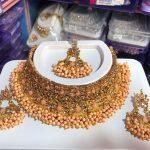 Golden And Peach Bindi, Earring And Necklace Set For Women